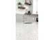 Close-up of the kitchen sink with quartz countertops, modern faucet, and tile backsplash at 5284 Indian Laurel Ct, Orlando, FL 32808