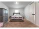Bright bedroom with a bed, large wardrobe, and plenty of natural light at 543 Nardello Dr, Deltona, FL 32725