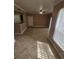 Inviting living room boasts tile floors, creating a seamless flow and easy maintenance at 5525 Pga Blvd # 4611, Orlando, FL 32839