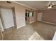 Bright living room featuring tile flooring and neutral paint, ready for comfortable living and easy customization at 5525 Pga Blvd # 4611, Orlando, FL 32839