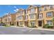 Lovely townhomes with brick shutters, tidy landscaping, and a convenient parking area at 628 Pensacola Ln # 628, Lake Mary, FL 32746