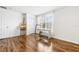 Bedroom featuring a window, desk, and wood look flooring at 725 Cresting Oak Cir # 117, Orlando, FL 32824