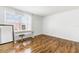 Bedroom featuring desk, chair, and window with blinds at 725 Cresting Oak Cir # 117, Orlando, FL 32824
