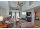 Bright living room featuring soaring ceilings, comfortable seating, and a welcoming atmosphere with lots of natural light at 7254 Della Dr, Orlando, FL 32819