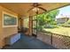 Relaxing screened-in patio with ceiling fan and comfortable seating at 7254 Della Dr, Orlando, FL 32819