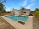 Inviting backyard pool with a concrete patio, perfect for outdoor entertaining and relaxation at 9345 Buttonwood St, Orlando, FL 32825