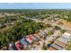 This aerial shows this house and neighborhood, close to the cross street, and the home's private pool at 9911 Dean Cove Ln, Orlando, FL 32825
