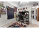 Bedroom featuring tile floors, ceiling fan, and unique decor at 9911 Dean Cove Ln, Orlando, FL 32825