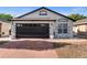 Charming single-story home featuring a two-car garage and nicely painted exterior at 9911 Dean Cove Ln, Orlando, FL 32825
