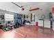 Spacious garage featuring washer, dryer, and weight lifting equipment at 9911 Dean Cove Ln, Orlando, FL 32825