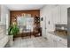 Kitchen featuring stainless steel appliances, granite countertops, and natural light at 9911 Dean Cove Ln, Orlando, FL 32825