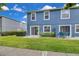 View of backyard featuring sliding glass door and outdoor seating at 12928 Lexington Summit St, Orlando, FL 32828