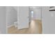 Bright entryway with neutral walls and flooring, leading to the main living areas at 12928 Lexington Summit St, Orlando, FL 32828