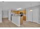 Eat-in kitchen showcasing stainless steel appliances, ample counter space, and wood cabinetry at 12928 Lexington Summit St, Orlando, FL 32828