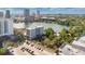 Stunning aerial view showcases the building's location near a serene lake and surrounded by lush greenery at 101 S Eola Dr # 812, Orlando, FL 32801