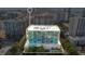 An aerial view of a high rise condo building outlined, with floor to ceiling windows and a community pool at 101 S Eola Dr # 812, Orlando, FL 32801