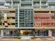 The building's well-maintained entrance features modern design and landscaping at 101 S Eola Dr # 812, Orlando, FL 32801
