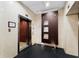 A view of the elevators with tile surroundings at 101 S Eola Dr # 812, Orlando, FL 32801