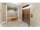 A view of the elevators with tile surroundings at 101 S Eola Dr # 812, Orlando, FL 32801