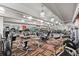 Wide gym space with weight machines, cardio equipment, and mirrored walls for fitness at 101 S Eola Dr # 812, Orlando, FL 32801