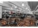 Large gym area featuring workout equipment and machines, mirrors, and unique flooring at 101 S Eola Dr # 812, Orlando, FL 32801