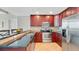 Well-equipped kitchen with stainless steel appliances, granite countertops, and ample cabinet space, great for cooking at 101 S Eola Dr # 812, Orlando, FL 32801