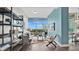 Elegant living room with floor-to-ceiling windows, modern decor, and hardwood floors, creating an inviting atmosphere at 101 S Eola Dr # 812, Orlando, FL 32801