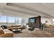 Comfortable lounge area with floor-to-ceiling windows offering scenic views at 101 S Eola Dr # 812, Orlando, FL 32801
