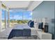 Bright main bedroom featuring floor-to-ceiling windows with stunning views and a modern design with hardwood floors at 101 S Eola Dr # 812, Orlando, FL 32801