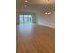 Spacious living room with ample natural light, recessed lighting, and sliding glass doors at 1016 Gloryland Ct, Sanford, FL 32771