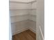Organized pantry features wire shelving for efficient storage and maximizing space at 1016 Gloryland Ct, Sanford, FL 32771