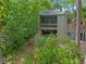 A two-story home surrounded by beautiful trees and featuring a balcony at 111 Crown Oaks Way # 101, Longwood, FL 32779
