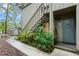 Charming condo exterior with lush landscaping, wooden siding, and a welcoming entrance at 111 Crown Oaks Way # 101, Longwood, FL 32779