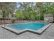 Inviting community pool offering a refreshing escape with comfortable seating and a well-maintained deck area at 111 Crown Oaks Way # 101, Longwood, FL 32779
