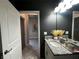 Modern bathroom featuring granite countertop and modern lighting at 11456 Short Story St, Orlando, FL 32832