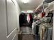 Efficient closet with practical wire shelving and storage drawers for folded items and accessories at 11456 Short Story St, Orlando, FL 32832