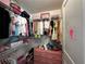 Walk-in closet equipped with wire shelving and storage providing a functional and organized space at 11456 Short Story St, Orlando, FL 32832