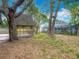 Backyard with gazebo and view of a screened-in pool at 1298 Scottsdale Dr, Ormond Beach, FL 32174