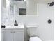 Fresh bathroom with updated fixtures, a new toilet and a modern vanity and mirror creates a welcoming space at 1298 Scottsdale Dr, Ormond Beach, FL 32174