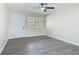 Bedroom with a ceiling fan and a window providing natural light at 1298 Scottsdale Dr, Ormond Beach, FL 32174