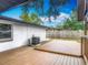 Wooden deck in backyard with air conditioning unit at 1298 Scottsdale Dr, Ormond Beach, FL 32174