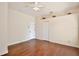 Bedroom featuring wood floors, walk in closet and ceiling fan at 1302 Shelter Rock Rd, Orlando, FL 32835