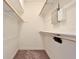 Functional walk-in closet offers plenty of shelving and storage options at 1302 Shelter Rock Rd, Orlando, FL 32835