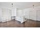 Bright loft with hardwood floors and white shelving adds character and extra storage at 1302 Shelter Rock Rd, Orlando, FL 32835