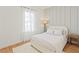Calming bedroom with neutral tones, natural light, and minimalist decor at 13247 Sw 83Rd Cir, Ocala, FL 34473
