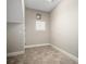 Unfinished basement featuring a tiled floor and access door at 13865 Granger Ave, Orlando, FL 32827