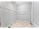 This closet has one wire shelf with a beige rug below it at 13865 Granger Ave, Orlando, FL 32827