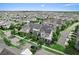 Beautifully designed townhome community with well-maintained streets, lush trees, and manicured lawns at 13865 Granger Ave, Orlando, FL 32827