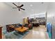 Open concept living room featuring modern decor and seamless transition to the kitchen at 13865 Granger Ave, Orlando, FL 32827