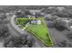 Aerial view of property outlined in yellow showing large lot size, home, and pool at 1415 Brumley Rd, Chuluota, FL 32766